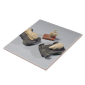 Kinderspeelgoed: een egel, een leeuw en een duif,  tegeltje (Zijkant)