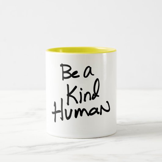 Kindheid is besmettelijk tweekleurige koffiemok (Center)