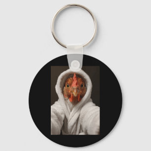 Kip die een selfie maakt in een witte Throbe Grapp Sleutelhanger
