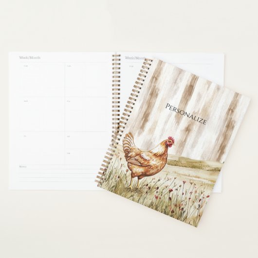Kip in grasveld van bloemen planner (Display)