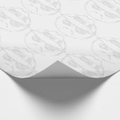 Kipana rijdt met laag tekstlaagje cadeaupapier (Hoek)