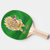 Kipkerst op groen tafeltennisbatje (Zijkant)