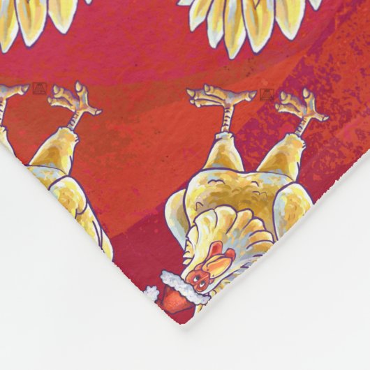 Kipkerst op rood fleece deken (Hoek)