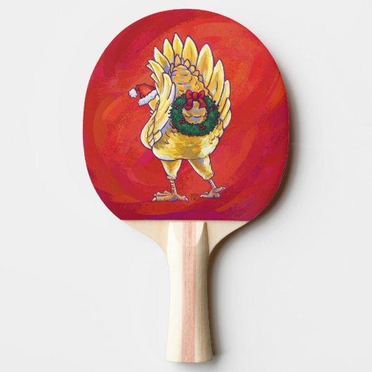 Kipkerst op rood tafeltennisbatje (Achterkant)