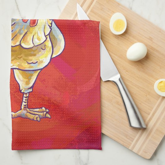 Kipkerst op rood theedoek (Quarter Fold)