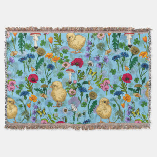Kippen en wilde bloemen op baby blauw deken