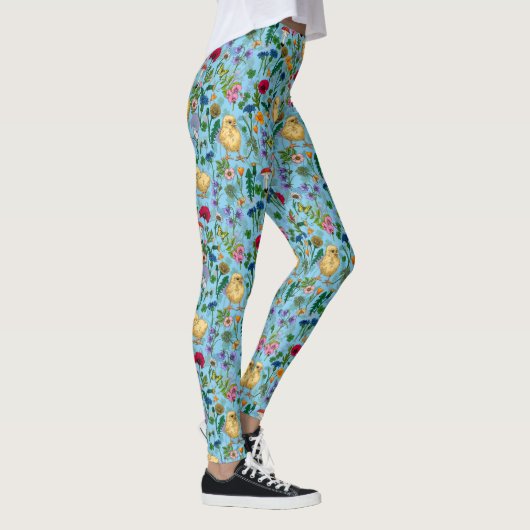 Kippen en wilde bloemen op baby blauw leggings (Rechts)