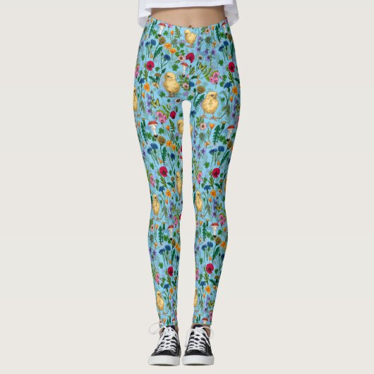 Kippen en wilde bloemen op baby blauw leggings (Voorkant)