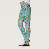 Kippen en wilde bloemen op baby blauw leggings (Links)