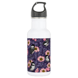 Kippen in het wild roos in roze en violet waterfles