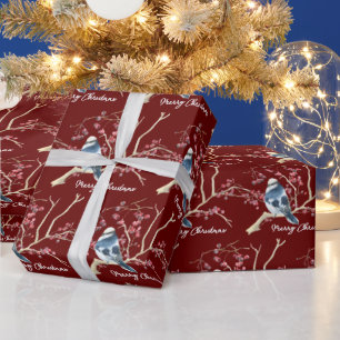 Kippen in kerstkleien cadeaupapier