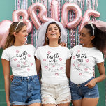Kiss The Miss Goodbye Bachelorette Party T-shirt<br><div class="desc">Deze leuke en flirte bachelorette weekendfeestoverhemden zijn perfect voor elke bruid- en bruidfeest die de komende grote dag viert! Het t-shirt bevat een selectie van roze lippen met de woorden "Kus the Miss Goodbye", de naam van de bruid en de datum. Het is perfect voor een vrijgezellenfeest, een feest of...</div>