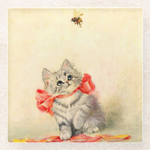 Kitten met een rood lint glazen onderzetter