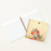 Kitten met een rood lint notitieboek (Binnen)