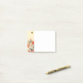 Kitten met een rood lint post-it® notes (Op bureau)