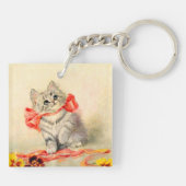 Kitten met een rood lint sleutelhanger (Achterkant)