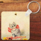 Kitten met een rood lint sleutelhanger (Achterkant)