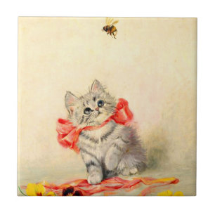 Kitten met een rood lint tegeltje