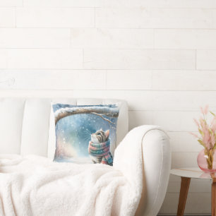 Kitten met een wintersjaal kussen