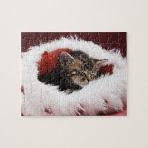 Kitten slaapt in kerstpet legpuzzel