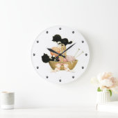 Kittens in mandje grote klok (Huis)