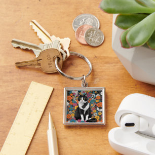Kitty tussen de bloemen sleutelhanger