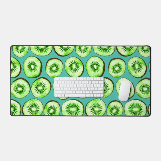 Kiwi snijdsels op turquoise bureaumat (Keyboard & Muis)