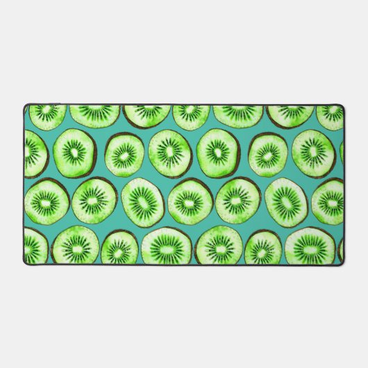 Kiwi snijdsels op turquoise bureaumat (Voorkant)