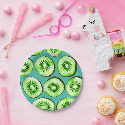 Kiwi snijdsels op turquoise papieren bordje (Feest)