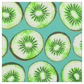 Kiwi snijdsels op turquoise stof (Close Up)