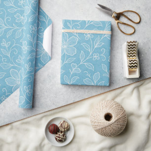 Klassiek blad bloemmotief op azuurblauw cadeaupapier