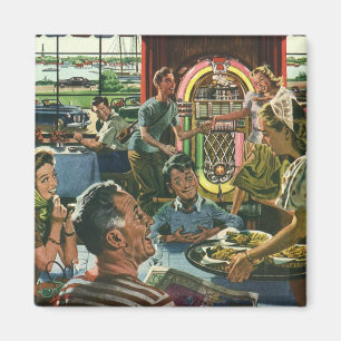 Klassiek familie diner in een diner met een jukebo magneet