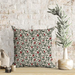 Klassiek kerst bloemenpatroon kussen<br><div class="desc">Dit prachtige vakantiewerpkussen heeft een met de hand getekend bloemmotief en groen patroon in klassieke,  traditionele kerstkleuren van diepgroen,  bordeaux rood en ivoor over een aangepaste kleurenachtergrond (weergegeven in licht zand beige). Stijlvolle inrichting die past bij elk huis,  of uw look is rustiek,  ,  eigentijds,  huisje,  boerderij,  of traditioneel.</div>