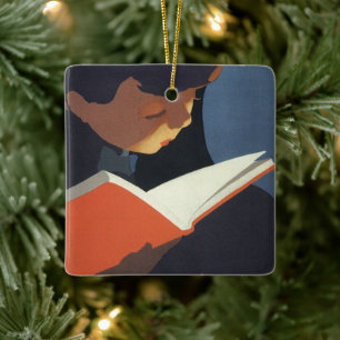 Klassiek kind leest een boek uit de bibliotheek keramisch ornament