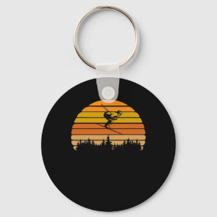 Klassiek skidesign met zonsondergang voor skiërs sleutelhanger