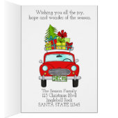 Klassieke kerstauto met fijne kerst met cadeaus (Binnen (Rechts))