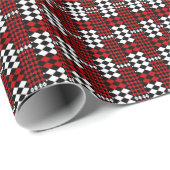 Klassieke kerstfeestdag met rode feestjes cadeaupapier (Rol Hoek)