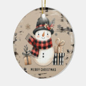 Klassieke kerstsneeuwpop op een warm geplakt ornam keramisch ornament (Links)