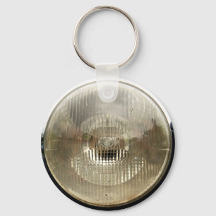 Klassieke koplamp met ronde, heldere glazen lens sleutelhanger