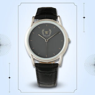 Klassieke laurel krans zwart goud monogram horloge