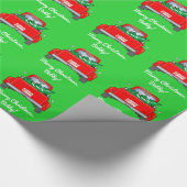 Klassieke ophaalwagen met kerstboom in bed cadeaupapier (Hoek)