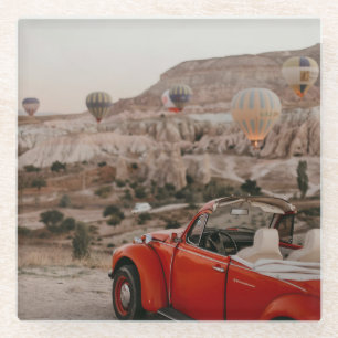 Klassieke  rode auto die warme luchtballonnen kijk glazen onderzetter