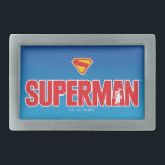 Klassieke Superman Bold Logo Gesp<br><div class="desc">Breng tijdloze superheldenenergie in uw stijl met dit opvallende Superman-ontwerp! Met de gewaagde rode "SUPERMAN" -tekst met een silhouet van het Man of Steel dat heldhaftig in de letters is geposeerd, pop dit kunstwerk tegen een slanke gradiëntblauwe achtergrond. Bovenop het iconische rode en gele "S"-schild is het een krachtig eerbetoon...</div>