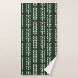 Klassieke vazen en groen op een donkergroene onder badhanddoek
