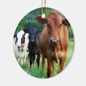 Klein beslag van drie koeien keramisch ornament (Links)