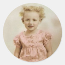 klein blond meisje in roze jurk stickers
