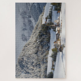 Klein dorp in de sneeuw in de Alpen in de winter Legpuzzel