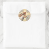 Klein engeltje dat lelies vasthoudt ronde sticker (Tas)