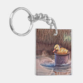 Klein geel bedekletsen in emmer sleutelhanger (Voorkant Links)