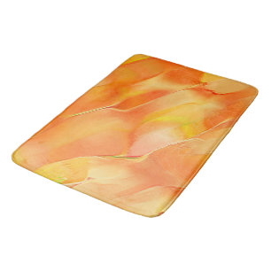 Klein geel en veel sinaasappel badmat